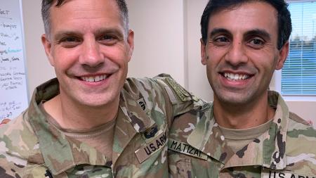 Peter Hofman, left, met with the man, now a U.S. soldier, who served as his interpreter in Afghanistan.