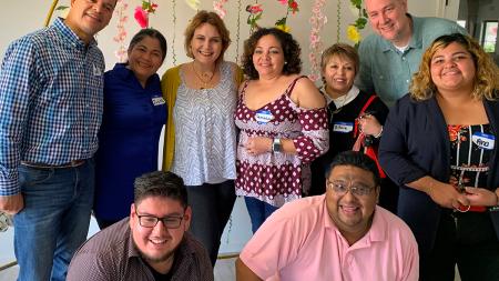 Participants discuss a milestone from <em>Our Journey 2025</em> at an event in Texas. OR Participants gather to celebrate Our Journey 2025 at an event in Texas.