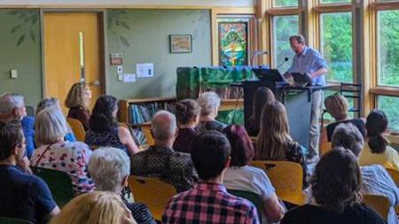 Gary Schmidt addresses workshop attendees during a session at Scriptoria on Calvin University's campus in Grand Rapids, Mich.