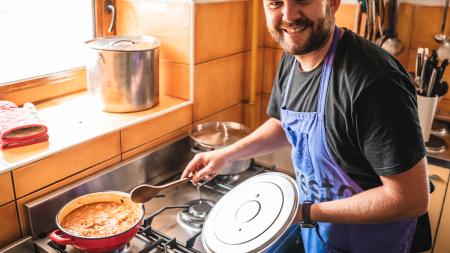 Working in the therapy center kitchen allowed Csaba to reflect on his life while preparing meals for others.