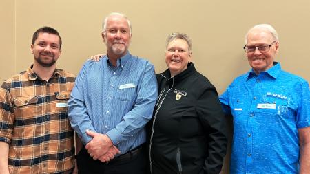 Bob Laarman (second from left), director of World Renew Disaster Response Services, with members of the Abbotsford Disaster Response Coalition.