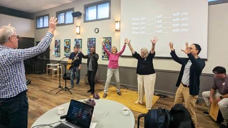 Participants engage in an activity at the wrap up event of the 2024 multicultural cohort. 