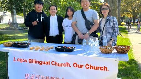 John Chen (second from left) helped to plant Logos Church in Zeeland, Mich. They meet in Third CRC’s sanctuary every Friday evening for a bilingual worship service.