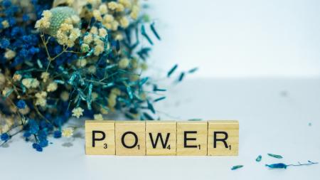 scrabble pieces spelling the word power