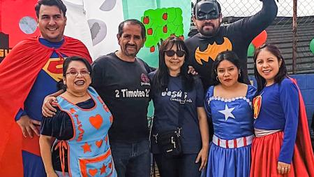 Maria, Rolando, and members of the church they lead held a community party for the grand reopening of the park. 
