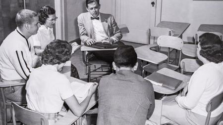 Dr. Cal Seerveld converses with students.