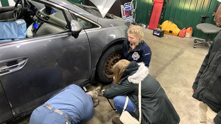 Grace Ann Kroondijk (center in blue jacket) is a student leader at the University of Guelph (Ontario) campus ministry.