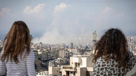 A cloud of smoke billows over a bombed area in Lebanon.