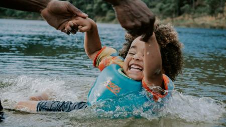 A child playing in a river