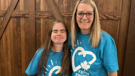 Two women from Friendship Ministry smiling at the camera