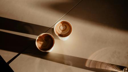 Two paper coffee cups