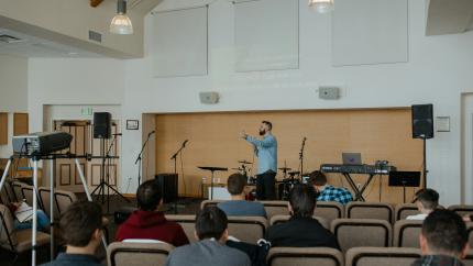 Leader speaking to audience