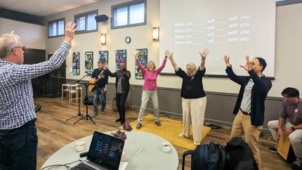 Participants engage in an activity at the wrap up event of the 2024 multicultural cohort. 