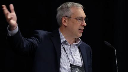 Stephen Terpstra speaks into a microphone