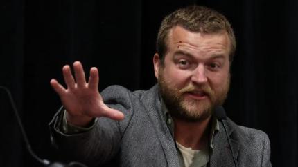 Jared Michelson gestures with his hand