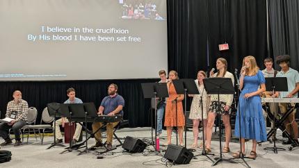 choir and team leading worship at Synod 2025
