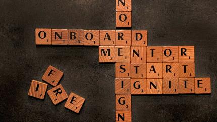 Scrabble tiles arranged to spell words