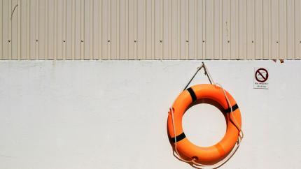 Life buoy ring hanging on wall