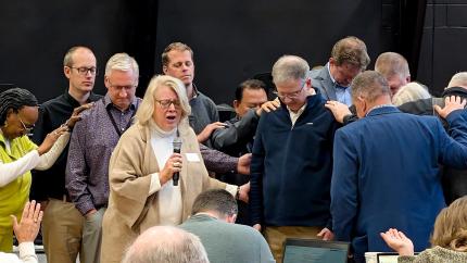 Lee Carter is prayed over