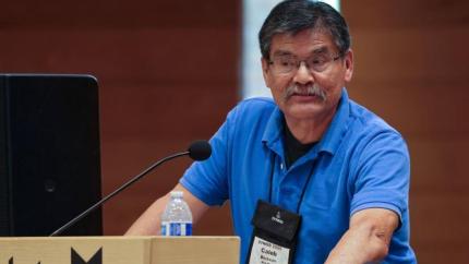 Synod 2026 delegate speaks from the podium