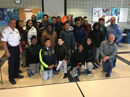 West Side Christian School students pose with Chicago police officers.