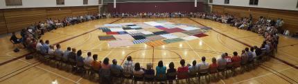 Synod 2016 delegates participate in the Blanket Exercise.