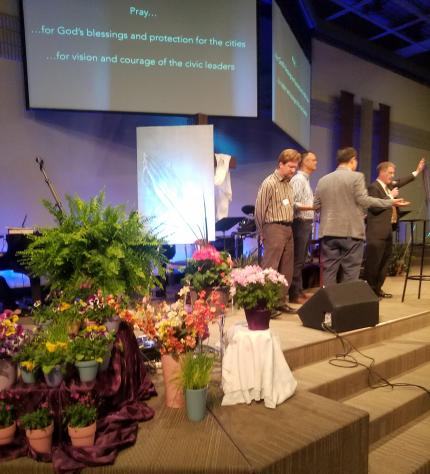 Praying at the West Michigan Prayer summit 