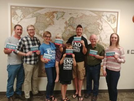 The family (centre) with friends in Winnipeg