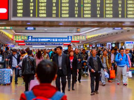 Watching people in a busy train station while reading a book from ReFrame's Chinese team, Zhao contemplated where people were really going in life.