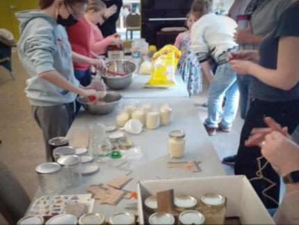 New Hope members make dry soup jars for their community.