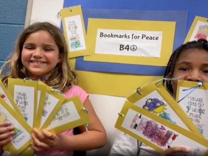 Abigail (left) worried about her grandparents in Kyiv. Her fellow grade 3 classmates prayed and helped to raise money for war survivors in Ukraine. 