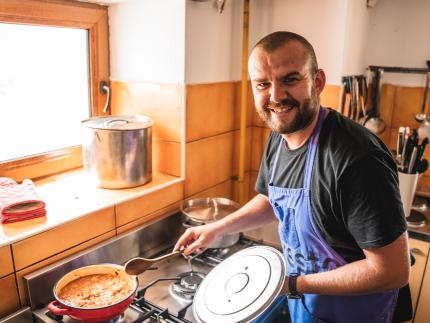 Working in the therapy center kitchen allowed Csaba to reflect on his life while preparing meals for others.