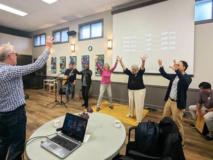 Participants engage in an activity at the wrap up event of the 2024 multicultural cohort. 