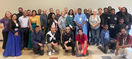 A large group of people from the intercultural cohort retreat in November 2025