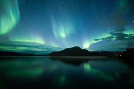 The northern lights over a lake