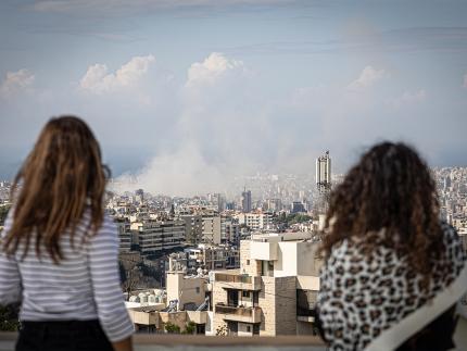 A cloud of smoke billows over a bombed area in Lebanon.