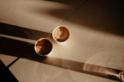 Two paper coffee cups