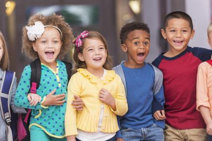 smiling children in a line