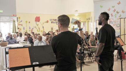 Pastor Bernard Emerson and Pastor Kyle Brooks speak to worshipers at Tapestry Church.