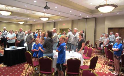 Cadet counselors and their families take part in devotions.