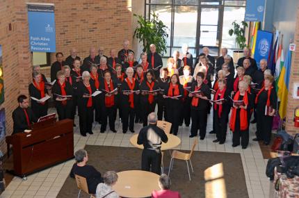 Jubilate Choir from Australia sings in the CRC’s Grand Rapids, Mich. office.