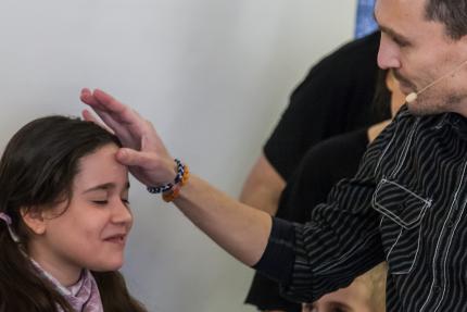 A young girl Is baptized at Elevation Church.