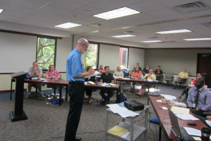 Steve Van Zanen, CRWM’s director for missions education and engagement, takes prayer requests after the missionaries told their stories.