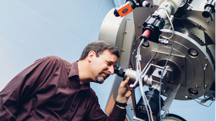 Larry Molnar at his telescope