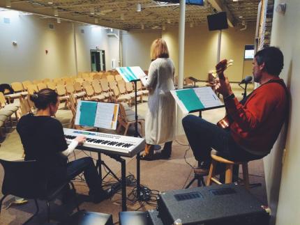 Members of City Reformed Church practice for worship