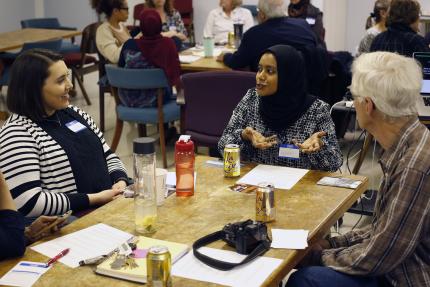 Muslims and Christians discussing their photographs in Richmond, Virginia .