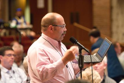 Joel Zuidema asked delegates to consider a special request to help immigrant churches.