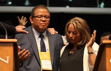 Eddy Alemán is prayed over after becoming General Secretary of the RCA.