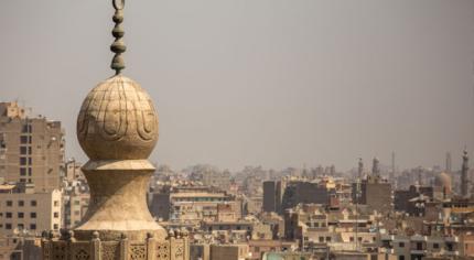 Dusty Cairo from the Top of a Minaret. For more photos from Egypt visit: http://twocamerasonemission.com/.