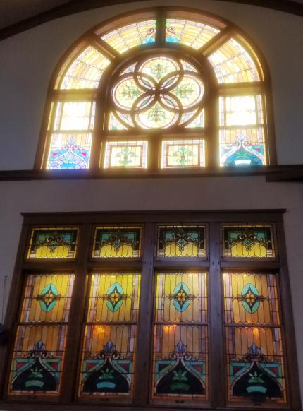 Two of the stained glass windows inside First CRC.